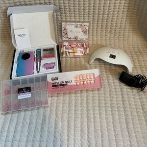 Nail Art Kit with Press On Nails, UV Lamp, And Drill